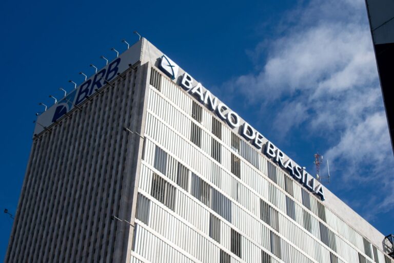 A prominent view of Banco de Brasília building with clear blue sky background in Brasilia.